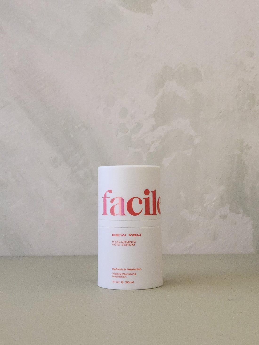 White cylindrical container with &