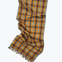 Plaid tablerunner in ochre yellow, sage green with a pop of blue.