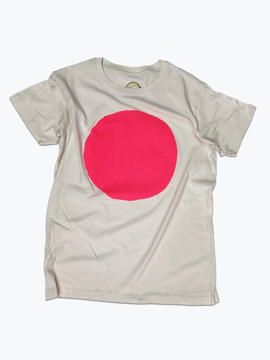Beige t-shirt with a pink circle on a white background