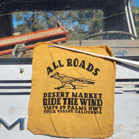 Yellow towel with text and logo on a vehicle interior