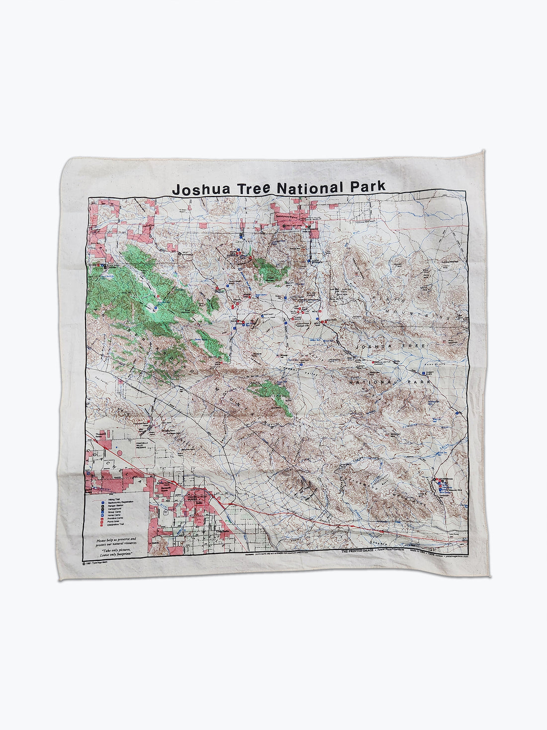 A cotton bandana with a topographical map of Joshua Tree National Park printed on it. 