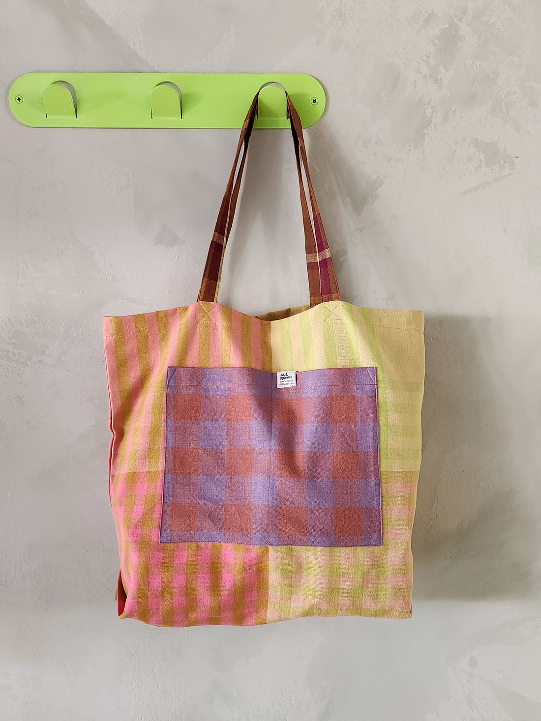 Mixed plaid tote bag.