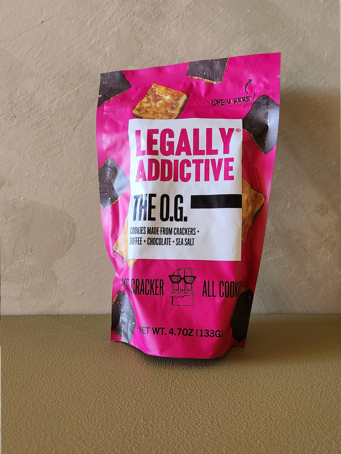 Pink snack bag labeled &