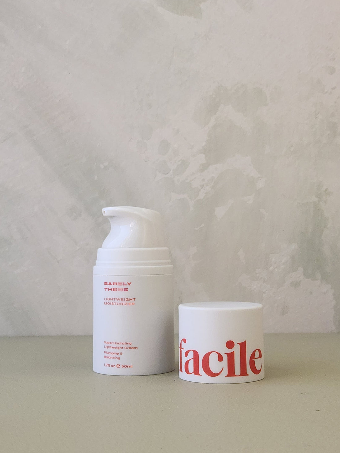 Two skincare products with &