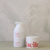 Two skincare products with 'facile' branding on a neutral background