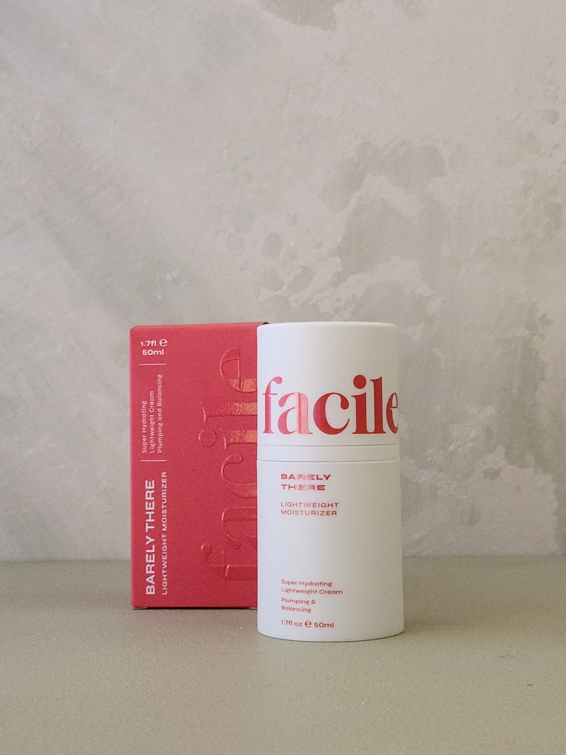 Barely There skincare product with red box on a neutral background
