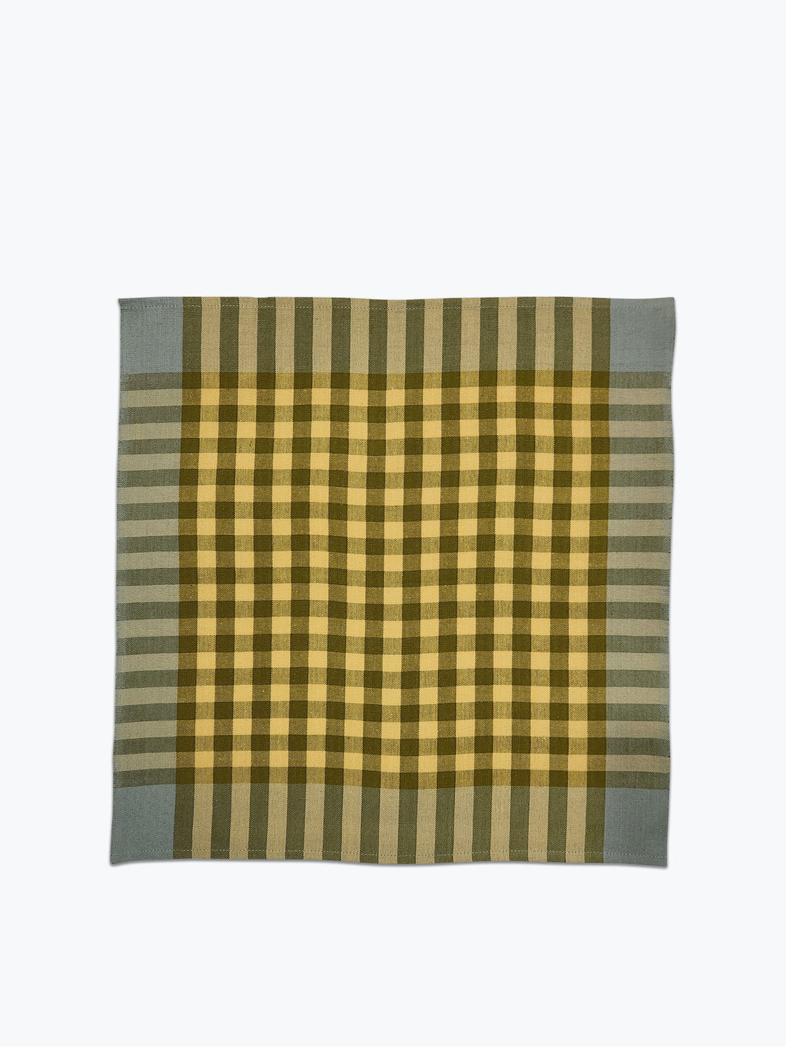 Plaid napkin in shades of green.