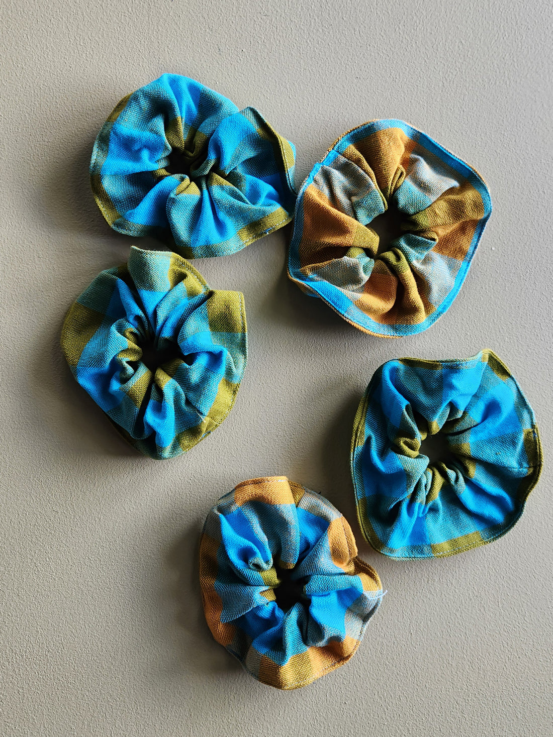 Turquoise, yellow and green plaid cotton scrunchie.