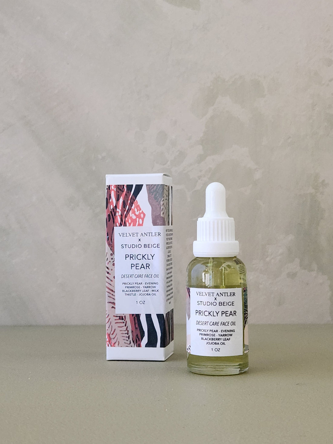 Bottle and box of Velvet Antler Studio Bruges Prickly Pear skincare product on a neutral background