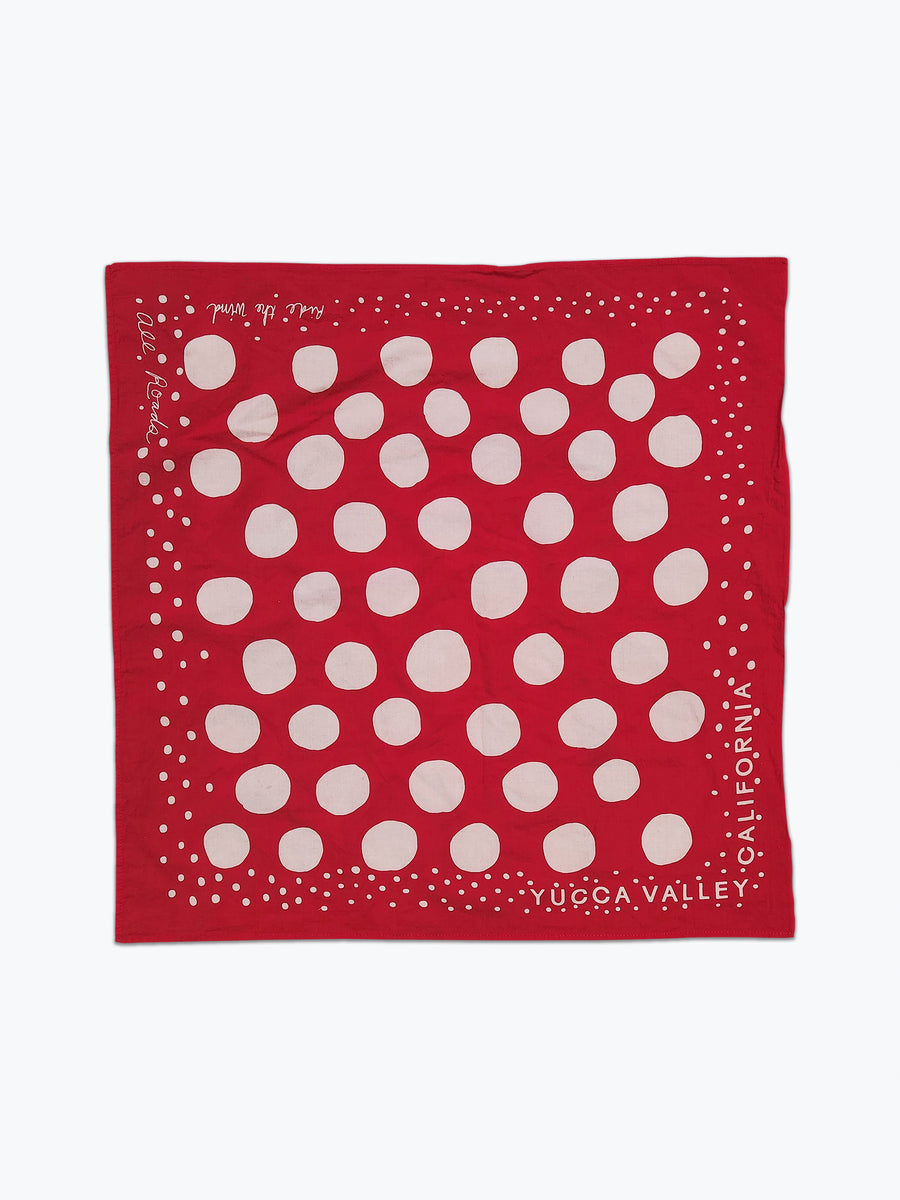 Red bandana with white circles