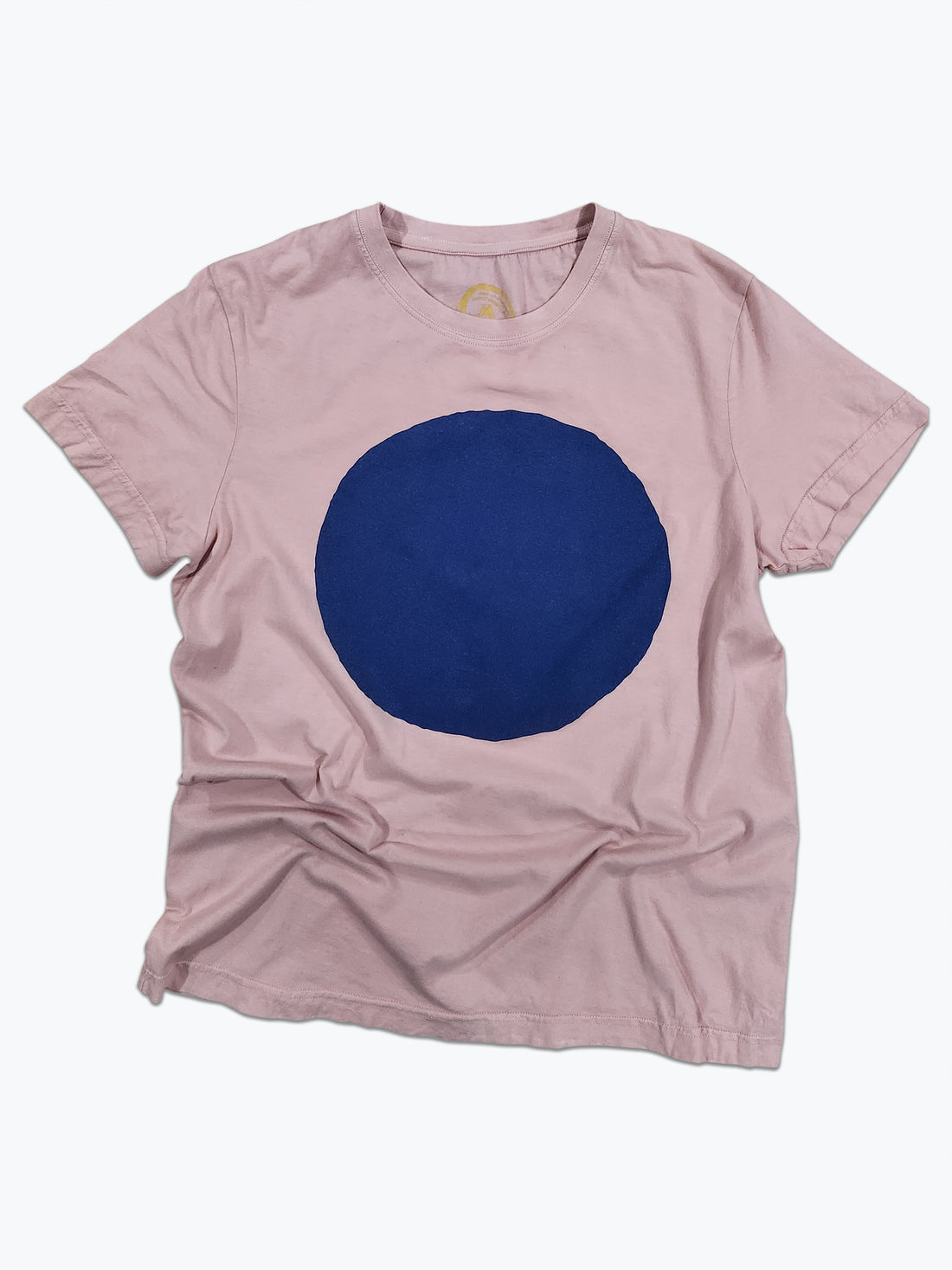 Pink t-shirt with a large blue circle on a white background