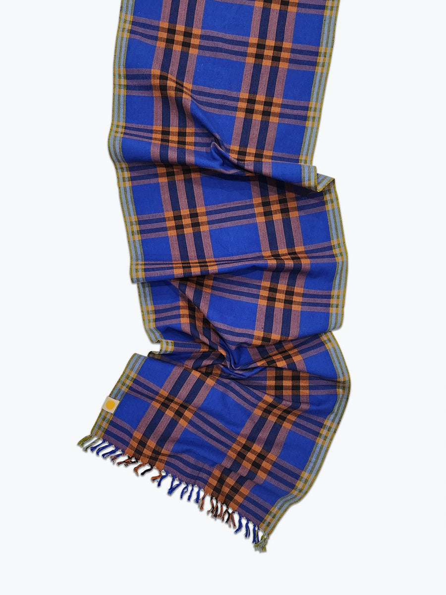 Plaid cotton tablerunner in cobalt blue, brown and black.