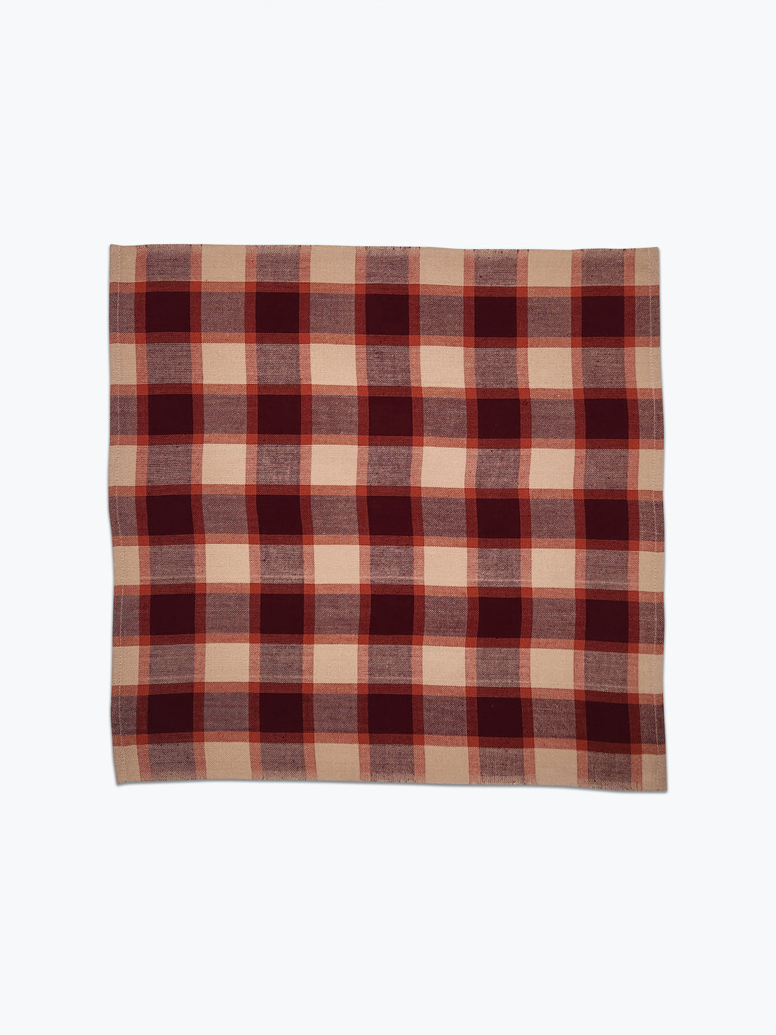 Plaid fabric with purple and beige pattern on a white background