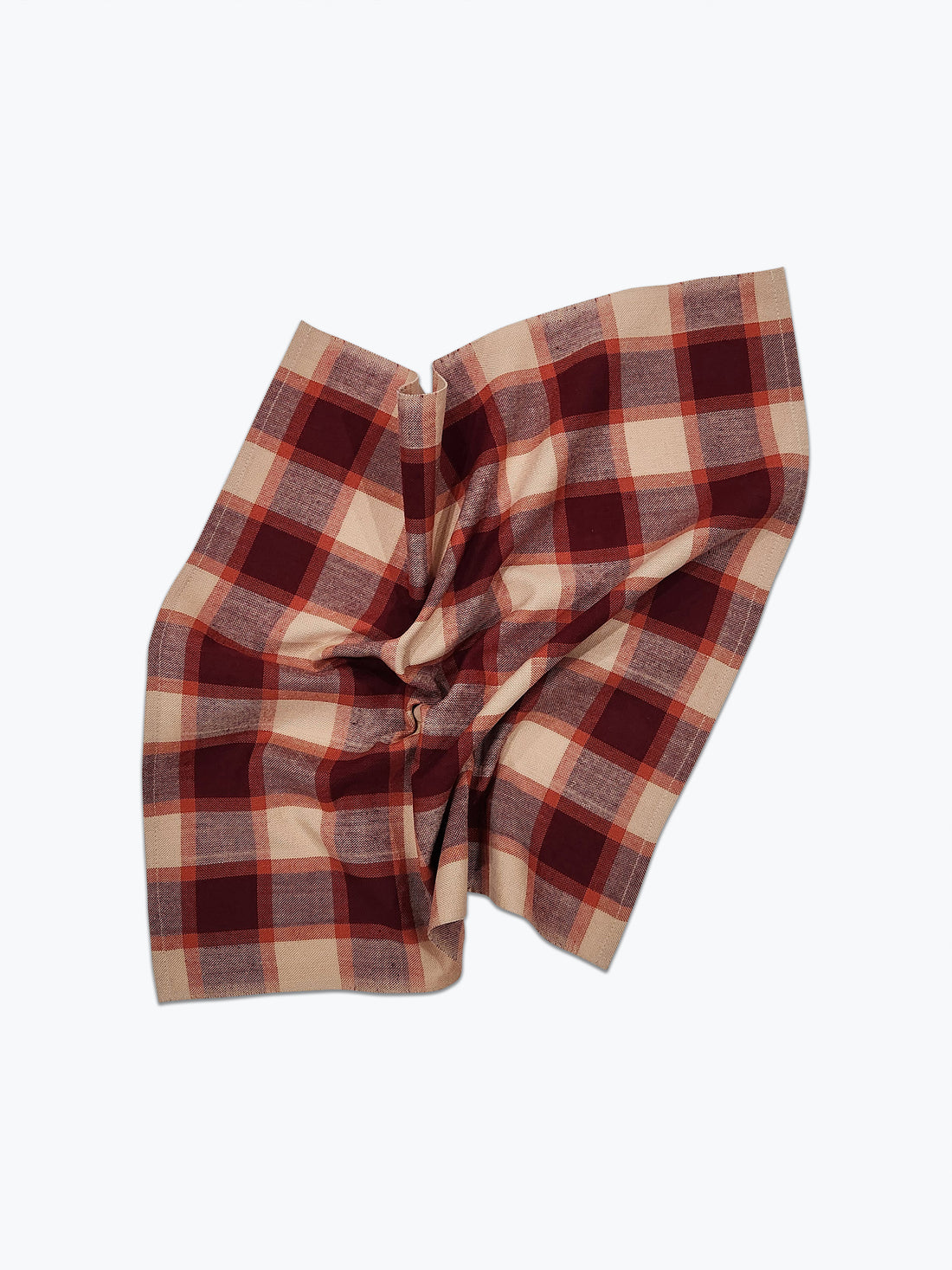 Plaid fabric with purple and beige pattern on a white background