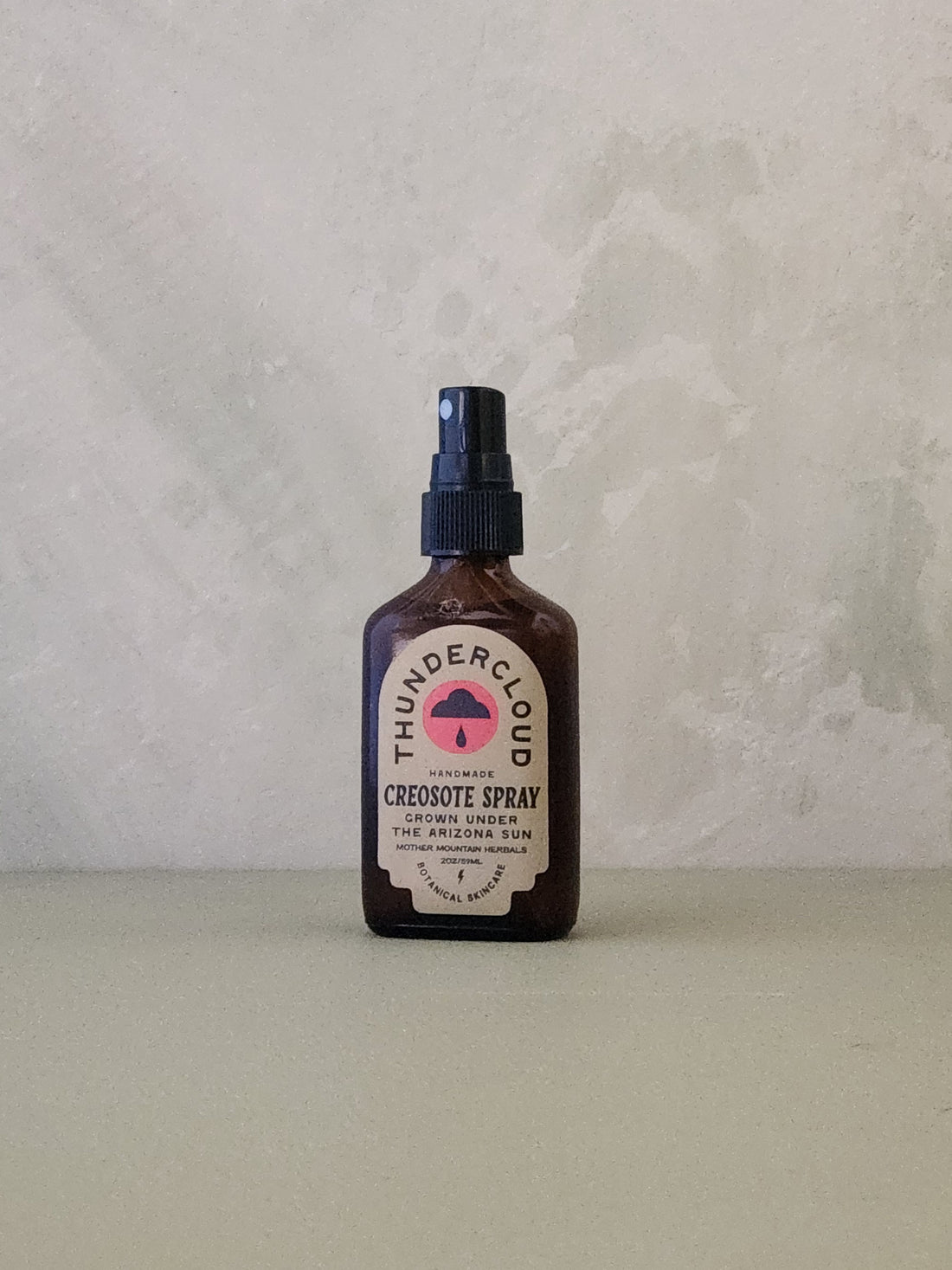 Bottle of creosote Spray with &