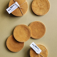 Set of 4 suede drink coasters. 