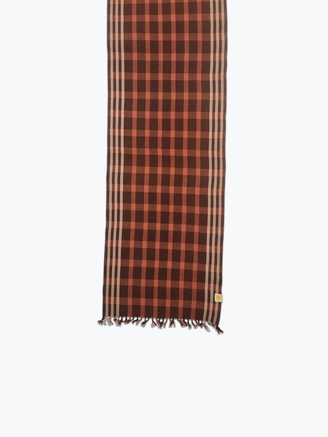 Plaid scarf with brown and salmon pattern on a white background